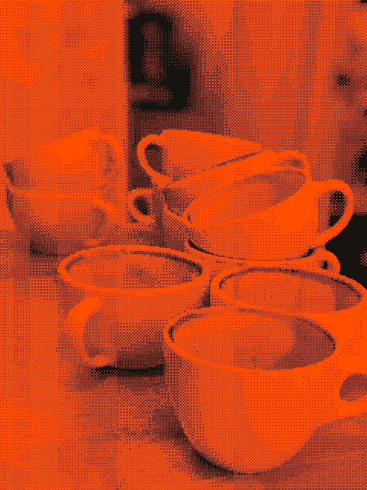 Rows of coffee mugs, ready for a full room